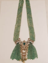 Long Green Strawberry Quartz Multi-Strand Bead Haaram Necklace with Intricate Peacock Motif Polki Pendant & Pearl Drops